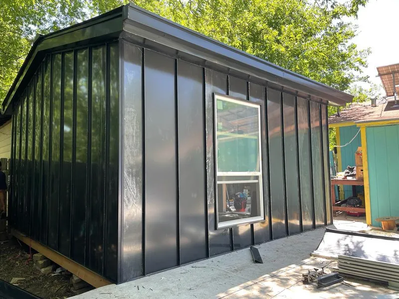 Black standing seam metal wall panels for Metal Roof Installation in Oneida